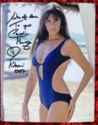 James Bond Caroline Munro signed 10 x 8 inch colour sexy blue swim suite photo, inscribed Naomi 007.
