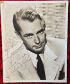 Veteran actor Alan Ladd signed 10 x 8 inch sepia portrait photo, dedicated to Heather. Tape marks to