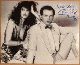 James Bond actress Caroline Munro signed sexy 10 x 8 b/w photo with pink lip stick kiss. Nice