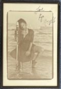 Music. Kym Mazelle signed on the glass of a framed black and white photo of Kym Mazelle. Signed in