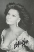 Sophia Loren signed 6x4inch black and white photo. Good condition. All autographs are genuine hand
