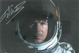 Felix Baumgartner signed 12x8 inch colour photo. Good condition. All autographs are genuine hand