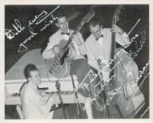 Malcolm Mitchell Trio, a signed (in white ink) 5x4 photo. Mitchell was an English jazz guitarist and