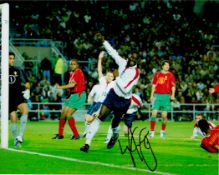 Ledley King Signed England Vs Portugal 10 x 8-inch Colour Photo. Signed in black ink. Good