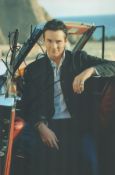 Russell Watson signed 12x8 colour photograph. Watson is an English tenor who has released singles