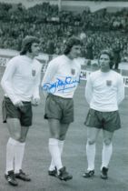 Roy McFarland signed 12x8 black and white photo picture while on England duty. Good condition. All