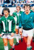 Johnny Giles signed 12x8 colour photo pictured leading the Republic of Ireland out in an