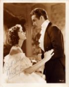 Robert Taylor in 'Camille' signed 10x8 inch sepia photo. Good condition. All autographs come with