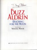 Buzz Aldrin signed hardback book titled Reaching for the Moon paintings by Wendell Minor signature