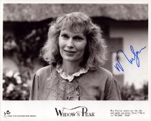 Mia Farrow signed 'Widow's Peak' signed 10x8 inch promo photo. Good condition. All autographs come