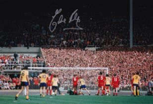 Football Autographed Eddie Kelly 12 X 8 Photograph: Colour, Depicting The Scene As Eddie Kelly's