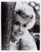 Donna Douglas signed 10x8 inch black and white photo. Good condition. All autographs come with a