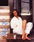 Kathleen Turner signed 10x8 inch colour photo. DEDICATED. Good condition. All autographs come with a
