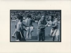 George Cohen signed Black and White Photo Mounted to an overall size of 10.5 x 14 inches' Good