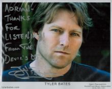 Tyler Bates signed 10x8 colour photo. Good condition. All autographs come with a Certificate of