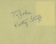 Kathy Staff signed yellow 6x4 album page. Good condition. All autographs come with a Certificate