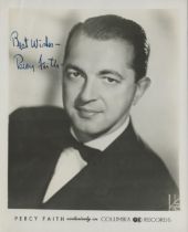 Percy Faith signed 10c8 inch black and white promo photo. Good condition. All autographs come with a