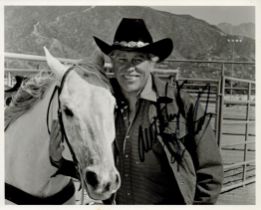 Howard Keel signed 10x8 inches black and white photo. Good condition. All autographs come with a