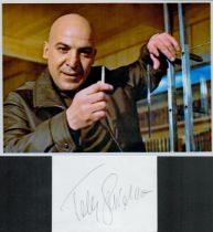 Telly Savalas signed album page with 10x8 unsigned colour photo. Good condition. All autographs come