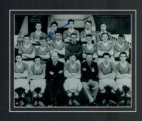 Wilf McGuinness signed mounted Manchester United Team black and white photo, 12x10 inch approx. Good