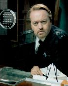 Bill Bailey signed 10x8inch colour photo. Good condition. All autographs come with a Certificate