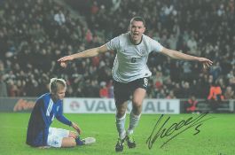 Football Michael Keane signed 12x8 inch colour photo pictured while celebrating while playing for