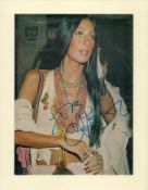 Cher signed 12x10 inch approx. mounted colour magazine photo. Good condition. All autographs come