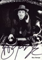 Boy George signed 6x4 inch black and white promo photo. Good condition. All autographs come with a