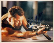Bruce Willis signed 10x8 inch Die Hard colour photo. Good condition. All autographs come with a