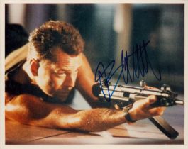 Bruce Willis signed 10x8 inch Die Hard colour photo. Good condition. All autographs come with a