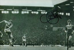 Graeme Sharp signed 12x8 inch black and white photo pictured scoring for Everton in the Merseyside