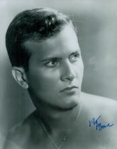 Pat Boone signed 10x8inch black and white photo. Good condition. All autographs come with a