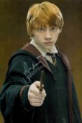 Rupert Grint signed 12x8 inch Harry Potter colour photo. Good condition. All autographs come with