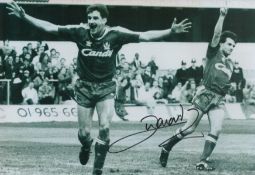 John Aldridge signed 12x8 inch black and white photo pictured celebrating while playing for