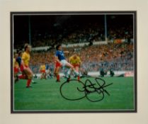 Graeme Sharp signed 12x10 inch overall mounted colour photo pictured in action for Everton against