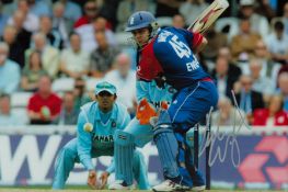 Luke Wright signed 12x8 inch colour photo pictured in action for England in a one day international.