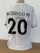 Football. Rodrigo Signed Leeds Utd Replica Home shirt UK size M. Tags still Present. Signed on. Good