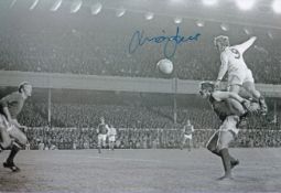 Autographed MICK JONES 12 x 8 Photograph : B/W, depicting a superb image showing Leeds United's MICK