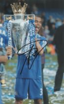 Ashley Cole signed 12x8 inch colour photo pictured with the Premier League trophy while with