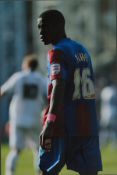 Wilfried Zaha signed 12x8 inch colour photo pictured in action for Crystal Palace. Good condition.