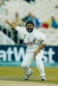 Mushtaq Ahmed signed 12x8 inch colour photo pictured in action for Sussex. Good condition. All