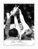 Autographed EVAN WILLIAMS 16 x 12 Limited Edition : Celtic goalkeeper EVAN WILLIAMS holds aloft