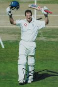 Andrew Strauss signed 12x8 inch colour photo pictured in action for England in test match cricket.