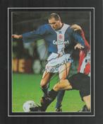Paul Gascoigne signed 12x10 inch overall mounted colour photo pictured in action for