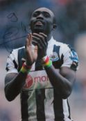 Papiss Cisse signed 12x8 inch colour photo pictured while playing for Newcastle United. Good