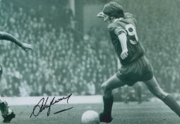 Steve Heighway signed 12x8 inch black and white photo pictured in action for Liverpool F.C. Good