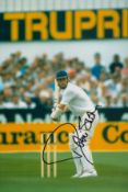 Robin Smith signed 12x8 inch colour photo pictured while in action for England in Test match