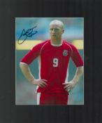 John Hartson signed 14x12 inch overall mounted colour photo pictured while playing for Wales. Good