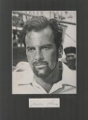 Maximillian Schell signature piece mounted below b/w photo. Approx overall size 13x10. Good