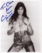British Actress Caroline Munro signed 10 x 8 inch black and white photo. Signed in blue ink,